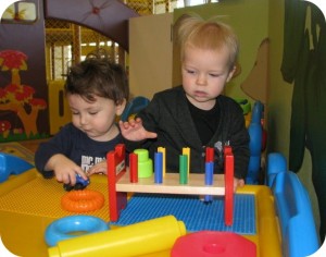 two toddlers playing