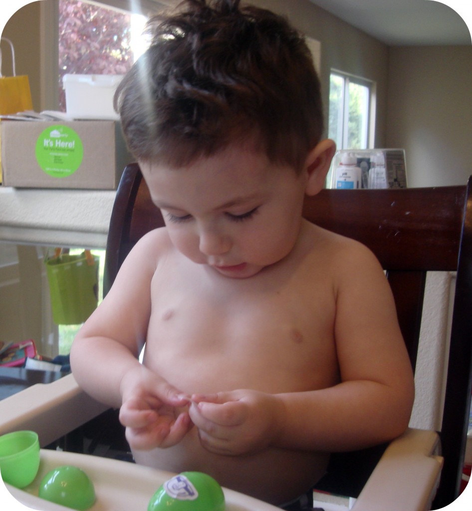 toddler stickers toddler putting stickers on easter egg