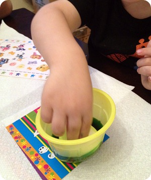 toddler dyeing eggs toddler dyeing eggs