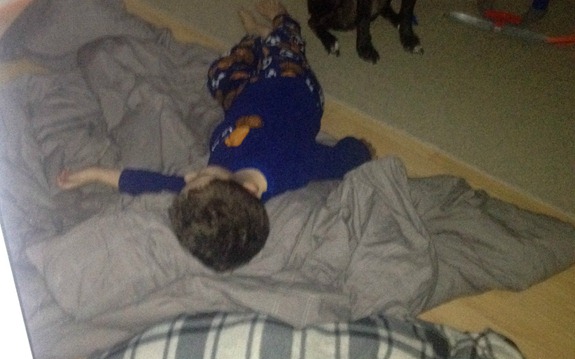 kid sick on floor kid sick on floor