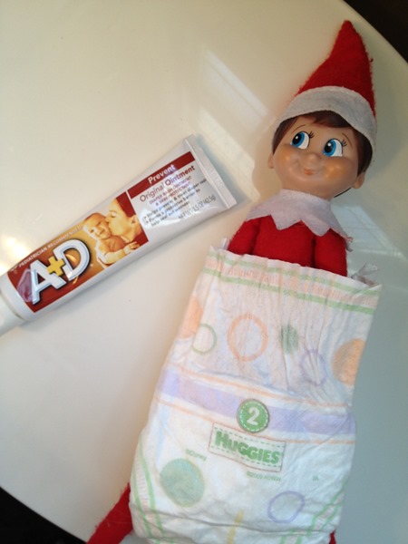 Elf on the Shelf trying to get a diaper change