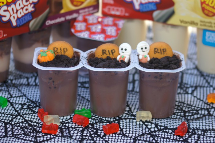 Looking for delicious and easy Halloween treats ideas? These adorable Graveyard Pudding Cups make great snacks or desserts- and they’re so simple!