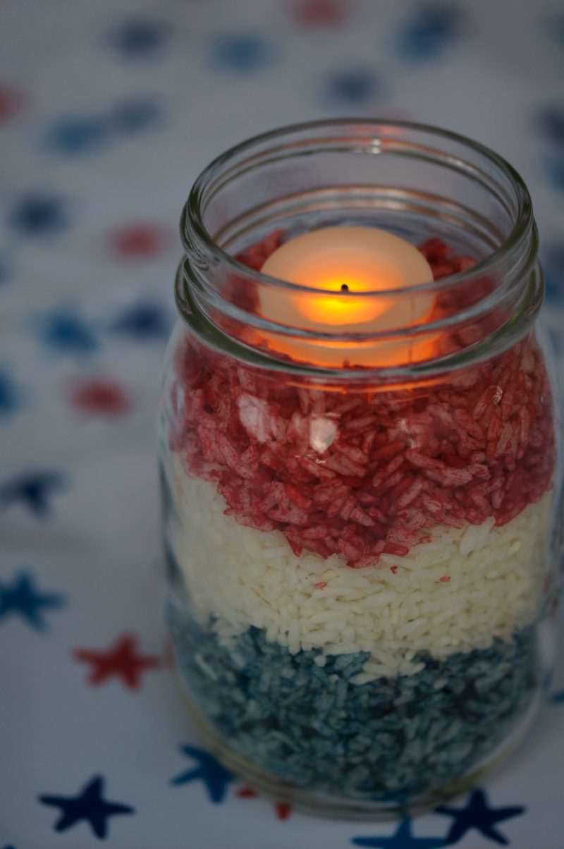 DIY Upcycled Mason Jar Candle Holder Glowing at Night