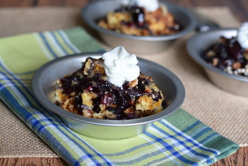 This easy blueberry cobbler recipe is the best! It only uses 4 ingredients- pie filling, cake mix, butter, and cinnamon- and tastes like it was homemade from scratch. It’s the perfect recipe for a lazy summer day!