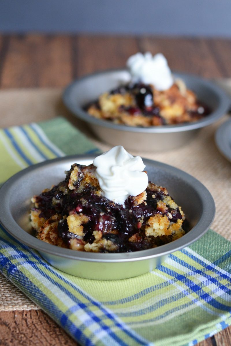 This easy blueberry cobbler recipe is the best! It only uses 4 ingredients- pie filling, cake mix, butter, and cinnamon- and tastes like it was homemade from scratch. It’s the perfect recipe for a lazy summer day!