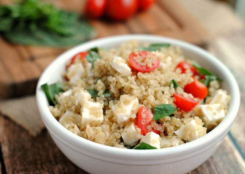 Need an easy lunch idea that you can bring to work? This Quinoa Caprese Salad is served cold so you don’t need a microwave, and it’s healthy, too! With just a few ingredients, this Mediterranean-inspired lunch salad is one of my favorite recipes.