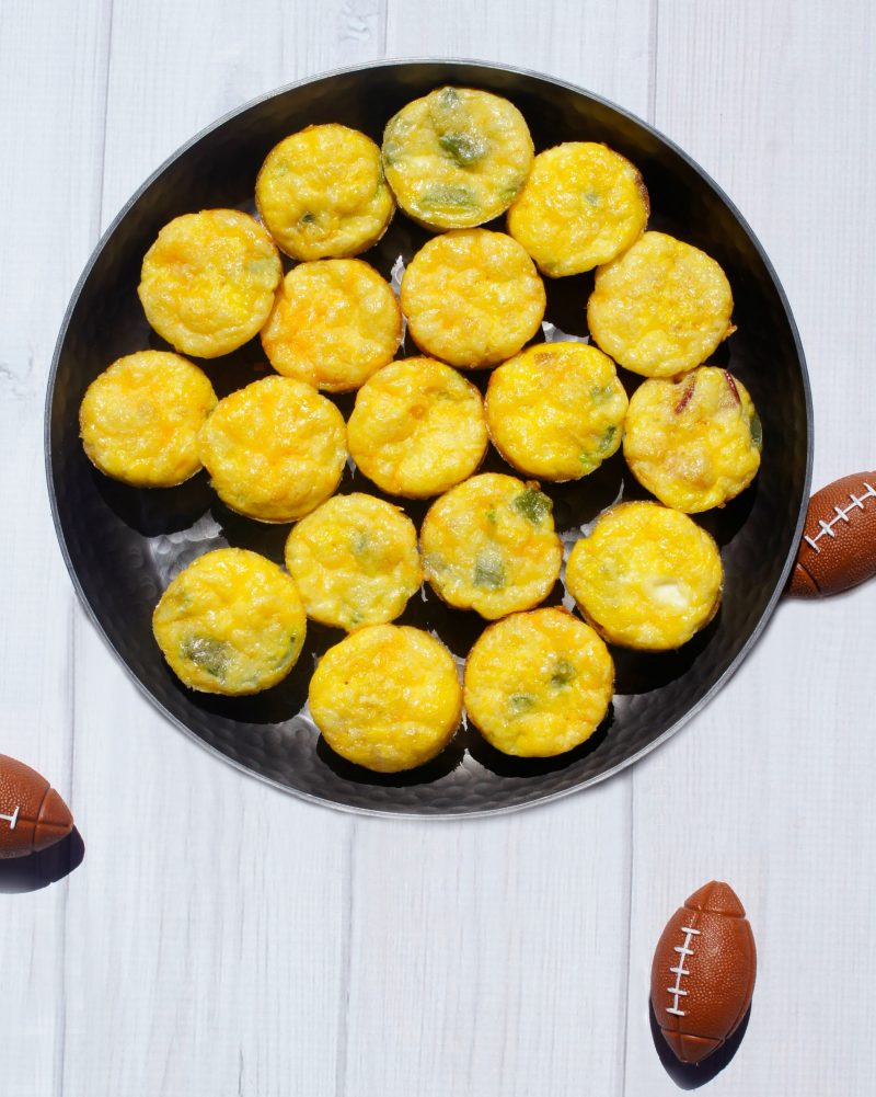 Whether you’re looking for make ahead healthy breakfast options or serving up appetizers for a football party, you have to try these Mini Breakfast Bites! They are made with egg, bacon, and veggies in mini muffin tins and are so easy to make and to customize!