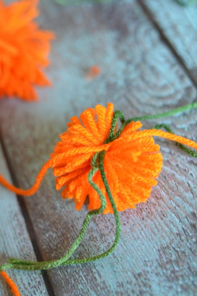 Easy DIY Yarn Pumpkins {+No Sew Pumpkin Garland!} {Not Quite} Susie
