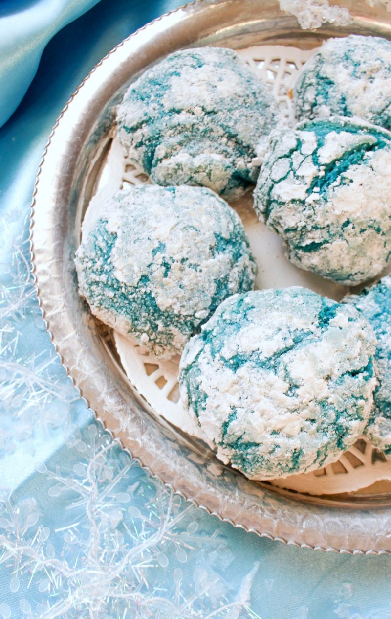 If you need recipes for the best cookie ideas, look no further. Whether you’re baking Christmas cookies for a cookie exchange or just trying to get the kids in the kitchen, these Blue Crinkle Cookies are perfect! They are delicious, easy, and unique- and they look like Queen Elsa herself decorated them!