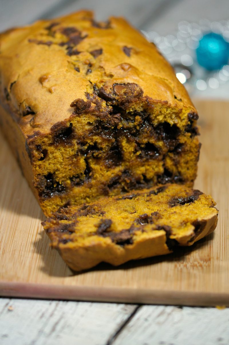 Need an idea for a great recipe to bake and gift this Christmas? Look no further- this easy recipe is for the best, most incredibly moist Pumpkin Chocolate Chip Bread! Totally loaded with chocolate chips, this bread will satisfy even the sweetest sweet tooth.