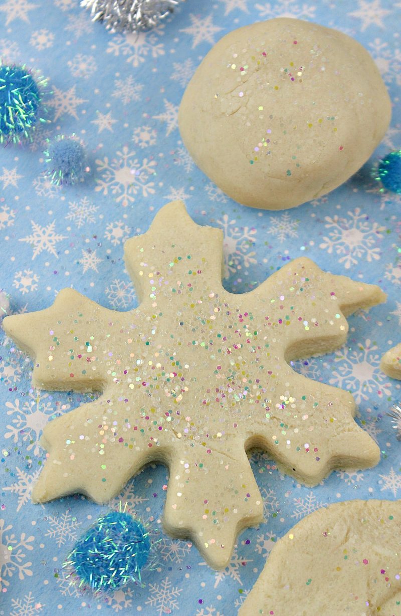 Kids and toddlers alike will love this fun DIY Marshmallow Scented Activity Dough! It’s a super soft playdough recipe that’s crazy easy to make {without cream of tartar- just a few simple ingredients!} and it’s no cook so the kids can even help!
