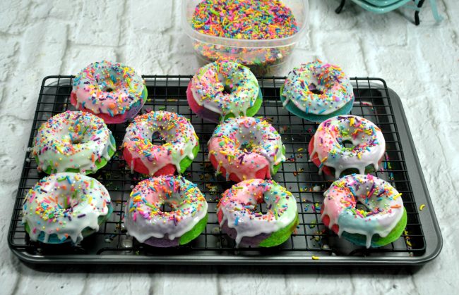 These DIY homemade baked donuts are better than good- they’re magical! Rainbow colored with a custom unicorn sprinkle blend, these are sure to be the hit of any birthday party or even just weekend breakfast! Learn how to make these easy and cute sprinkles donuts- one of my favorite recipe ideas!