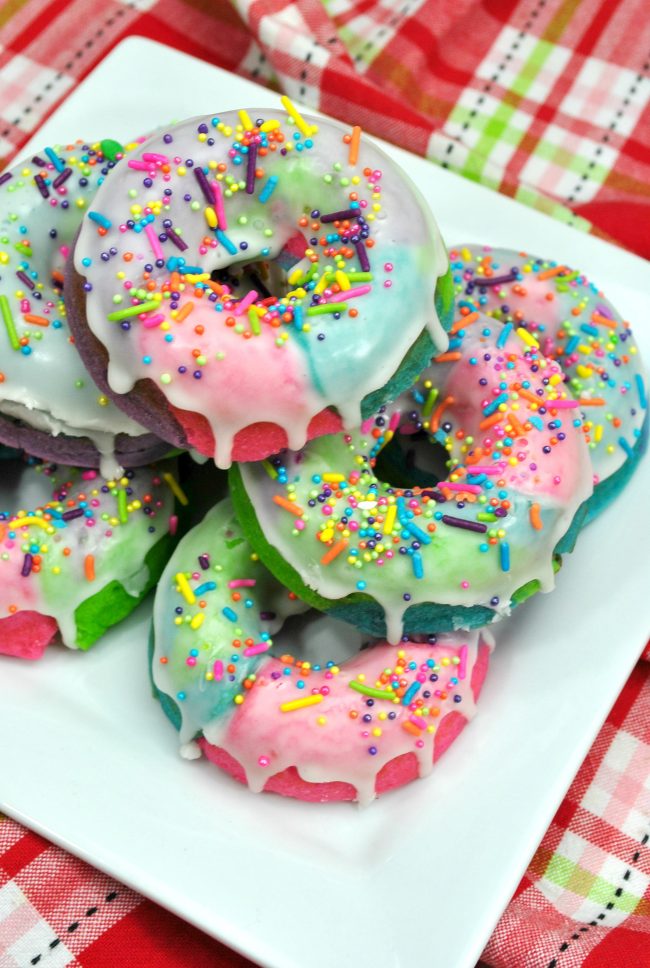 These DIY homemade baked donuts are better than good- they’re magical! Rainbow colored with a custom unicorn sprinkle blend, these are sure to be the hit of any birthday party or even just weekend breakfast! Learn how to make these easy and cute sprinkles donuts- one of my favorite recipe ideas!