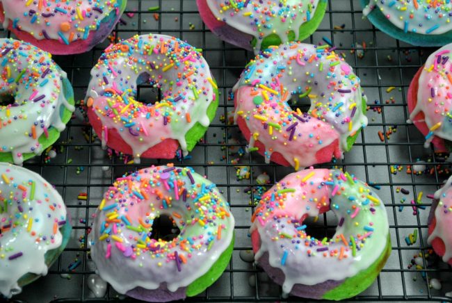 These DIY homemade baked donuts are better than good- they’re magical! Rainbow colored with a custom unicorn sprinkle blend, these are sure to be the hit of any birthday party or even just weekend breakfast! Learn how to make these easy and cute sprinkles donuts- one of my favorite recipe ideas!