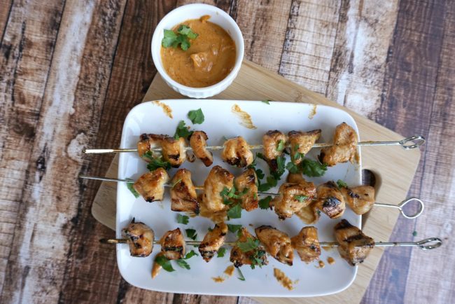 Looking for a great summer recipe you can throw on the grill? Check out this Grilled Chicken Kebabs with Spicy Peanut Sauce recipe! They’re super easy- just marinade the chicken, make a three ingredient sauce, put the chicken on skewers and pop them on the grill!