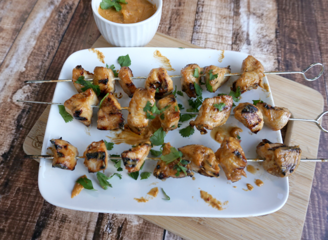 Looking for a great summer recipe you can throw on the grill? Check out this Grilled Chicken Kebabs with Spicy Peanut Sauce recipe! They’re super easy- just marinade the chicken, make a three ingredient sauce, put the chicken on skewers and pop them on the grill!