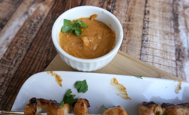 Looking for a great summer recipe you can throw on the grill? Check out this Grilled Chicken Kebabs with Spicy Peanut Sauce recipe! They’re super easy- just marinade the chicken, make a three ingredient sauce, put the chicken on skewers and pop them on the grill!