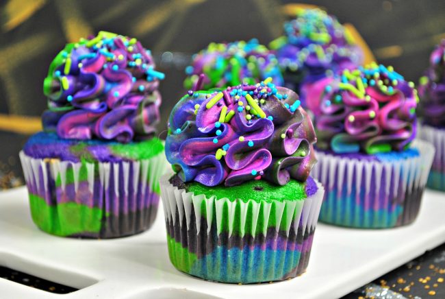 Are you excited about the newest Star Wars movie, Solo: A Star Wars Story? Or do you just love all things galaxy? Either way, these DIY delicious and gorgeous galaxy cupcakes aren’t just space inspired with the frosting- the whole cupcake is out of this world! They’re perfect for birthday parties or just appreciating the beauty of the universe. Get the recipe tutorial and learn how to make them now!