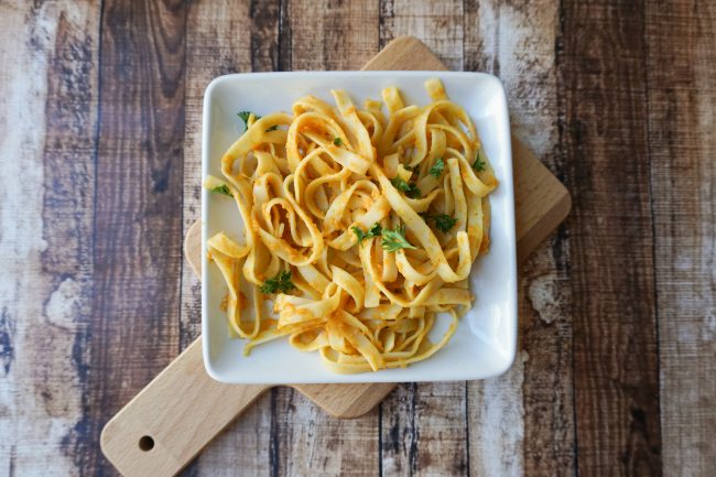 I love fettuccine- but my lactose intolerance doesn’t love alfredo anymore. I get sick of using the same marinara all the time so I decided to make a delicious and light pumpkin pasta sauce perfect for the fall- or really any time! You can enjoy the recipe alone or add some chicken in for some extra protein.