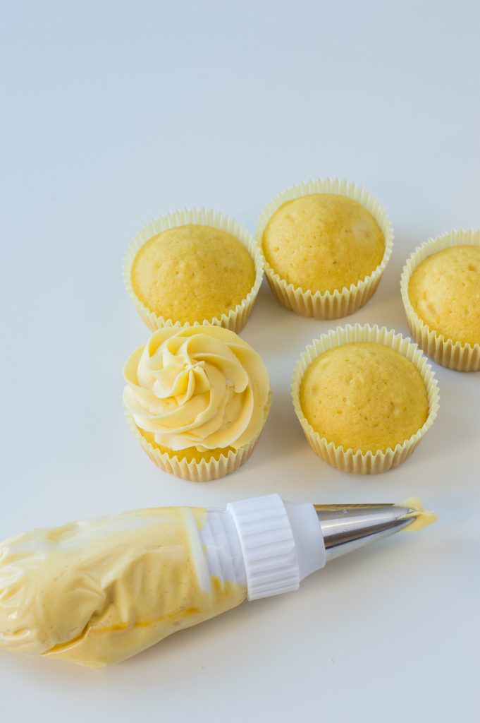 Whether you need ideas for a birthday party or having a lemonade stand- or just want some easy and adorable lemon desserts- this Lemonade Cupcakes recipe is perfect! These homemade cupcakes are delicious and finished with the cutest decoration for a sweet treat!