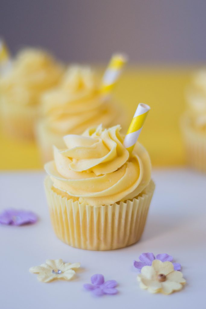 Whether you need ideas for a birthday party or having a lemonade stand- or just want some easy and adorable lemon desserts- this Lemonade Cupcakes recipe is perfect! These homemade cupcakes are delicious and finished with the cutest decoration for a sweet treat!