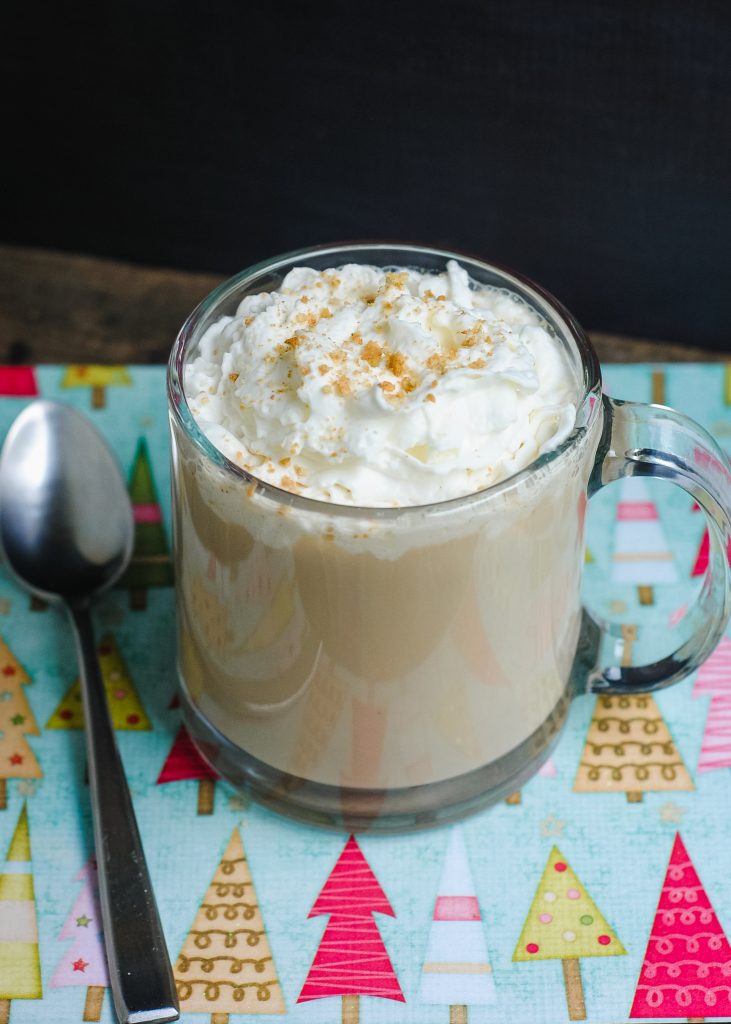 Miss the Starbucks Gingerbread Latte? You can still have a homemade version! This recipe includes directions for making your own hot or iced Gingerbread Latte {red cup not included} and breaks down how to make the Gingerbread Syrup- which you can use for other recipes, like cupcakes or French Toast!