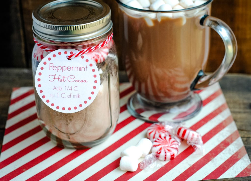 Christmas gifts are fun to give, but when you have to think of ideas for teachers, for coworkers, and for friends- it adds up fast. This easy DIY Gift in a Jar recipe is a great- and cheap- way to give a small food gift to those you love at the holidays. {It’s great for women and even for teens!}