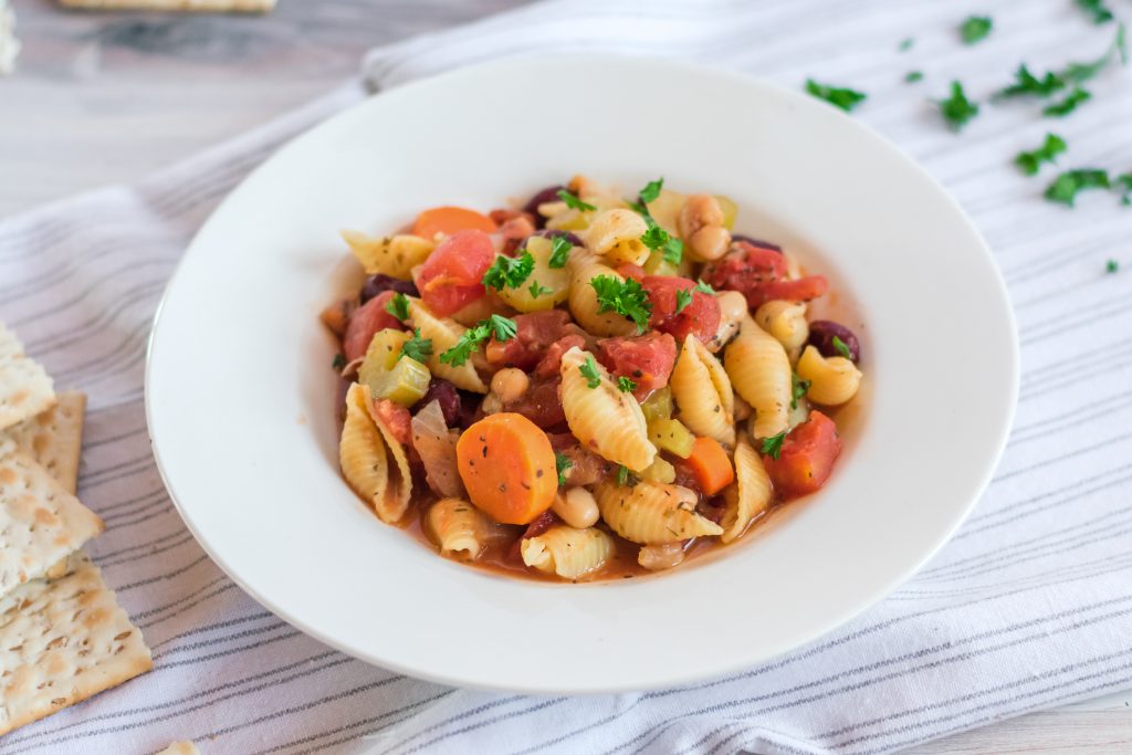 Need a new delicious, healthy vegetarian soup recipe? This Slow Cooker Minestrone Soup is so easy to make in your Crock Pot! It’s full of <a href=