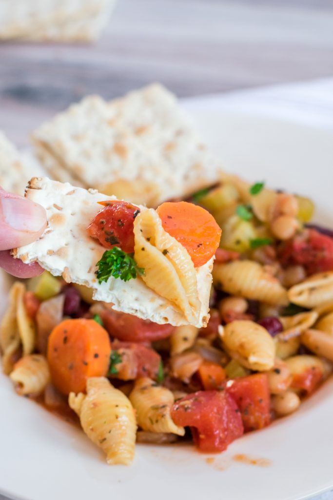 Need a new delicious, healthy vegetarian soup recipe? This Slow Cooker Minestrone Soup is so easy to make in your Crock Pot! It’s full of beans and vegetables for a healthy dinner and it makes enough to serve the whole family- with leftovers!