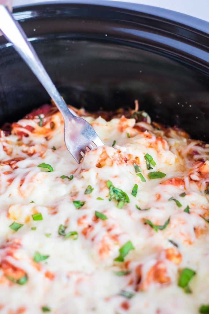 Is there anything more comforting than a delicious, warm Baked Ziti with Ricotta? This Slow Cooker Baked Ziti recipe is made using a crockpot so it’s ready when you are, and best of all it’s super easy! This version is Vegetarian, but if you’re not into meatless you can always add to it!