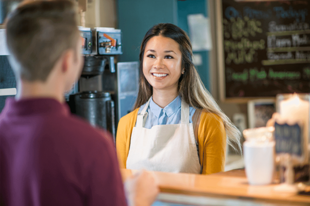 buying coffee in a cafe